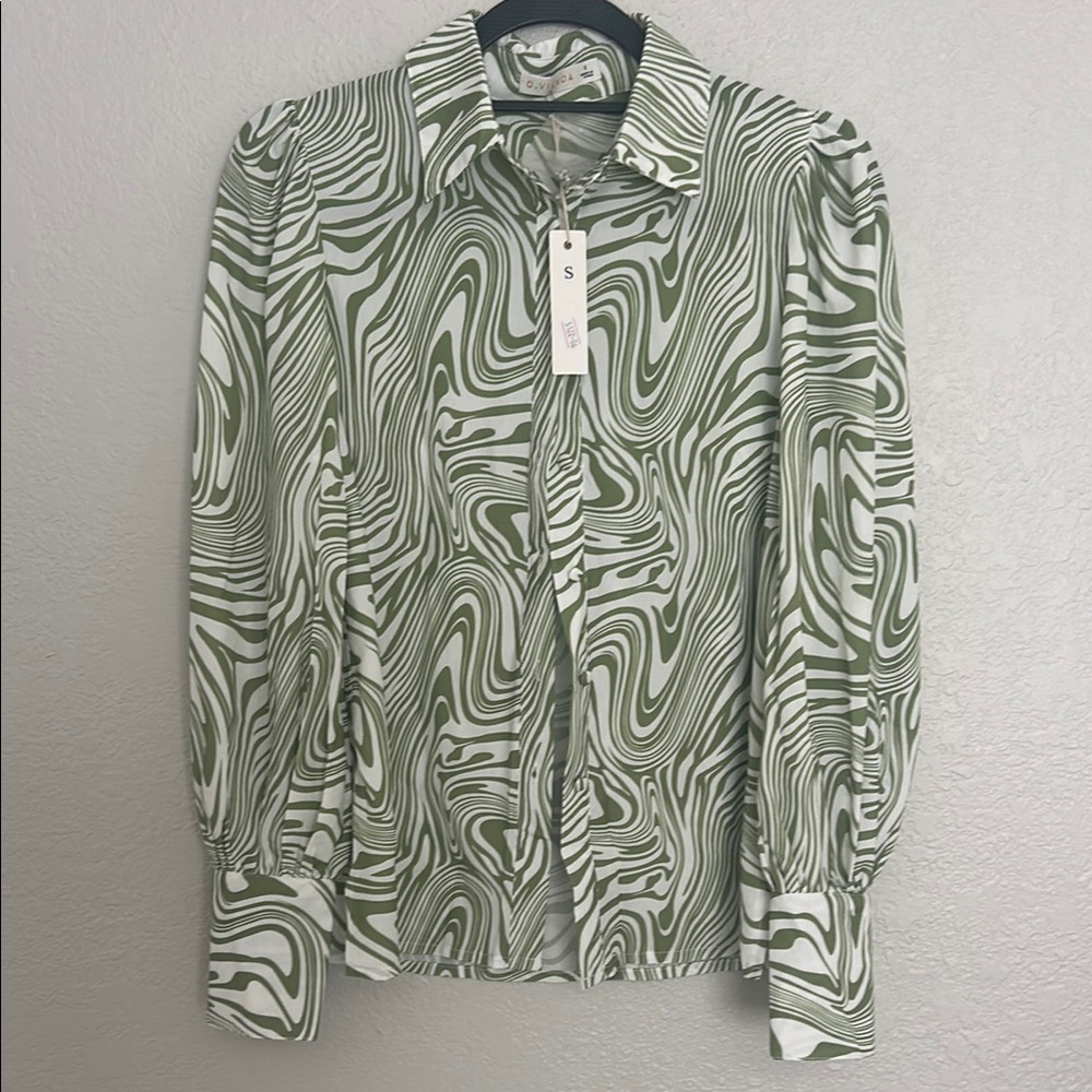 Green and White Patterned Woman’s Blouse